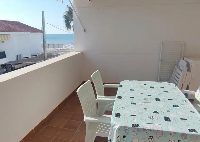Islantilla-Apartamento con piscina y garaje en primera línea de playa